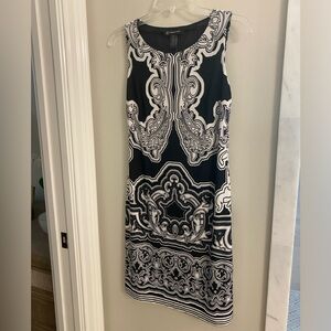 Black and white tank sheath dress .  Poly/spandex. Lined
